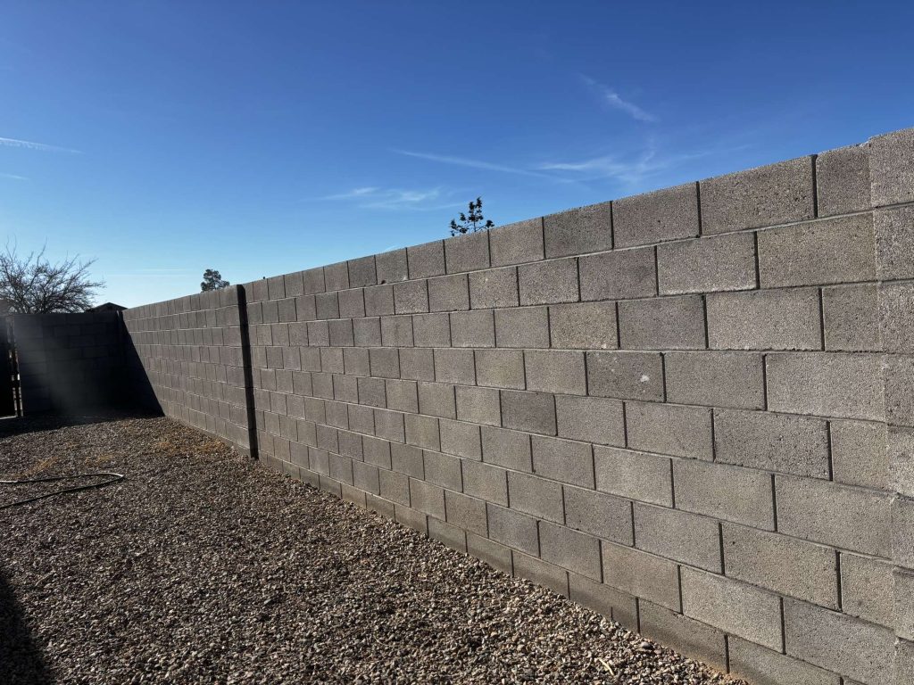 Block wall around the yard of a home in Kingman, Arizona.
