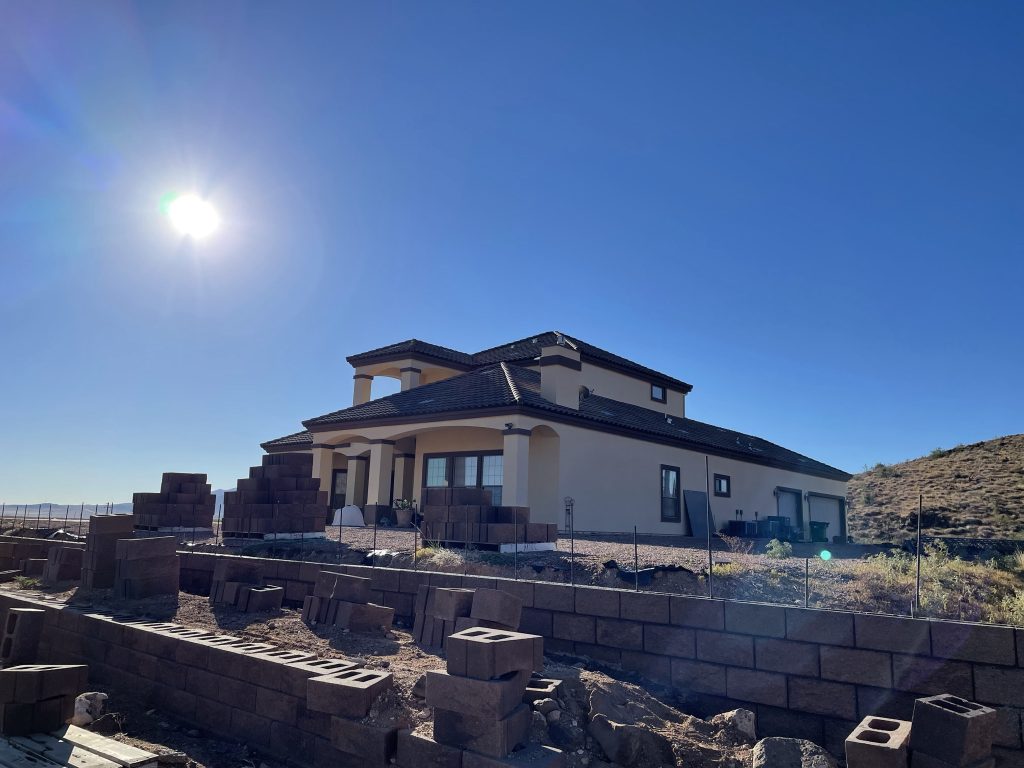 Block wall being installed around a home in Kingman, Arizona.